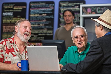 simsearch:400-08737249,k - Laughing people in a coffee house with laptop Foto de stock - Super Valor sin royalties y Suscripción, Código: 400-07244043