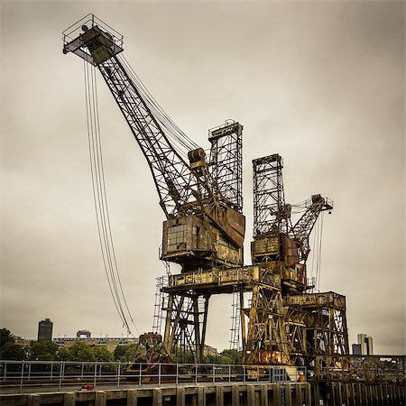 rundown factory - Rusty cranes at Battersea power station in London, UK Stock Photo - Budget Royalty-Free & Subscription, Code: 400-07245432