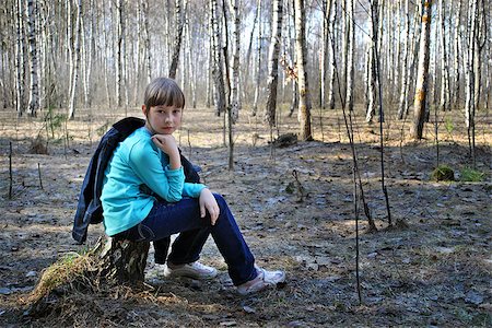 simsearch:400-06520162,k - Girl sitting on a stump in thought in the forest Stock Photo - Budget Royalty-Free & Subscription, Code: 400-07245566