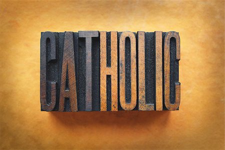 simsearch:400-07325569,k - The word CATHOLIC written in vintage letterpress type Fotografie stock - Microstock e Abbonamento, Codice: 400-07245599