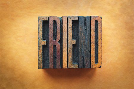 simsearch:400-07325569,k - The word FRIEND written in vintage letterpress type. Fotografie stock - Microstock e Abbonamento, Codice: 400-07245612