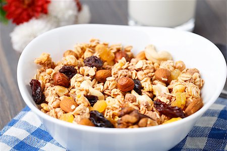 simsearch:400-06761866,k - Healthy muesli breakfast, with lots of dry fruits, nuts and grains Photographie de stock - Aubaine LD & Abonnement, Code: 400-07246232