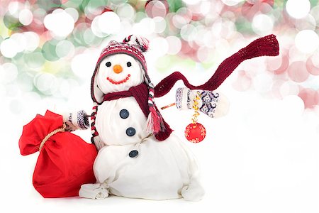 simsearch:400-05681859,k - Happy snowman with hat, scarf and christmas toy Stock Photo - Budget Royalty-Free & Subscription, Code: 400-07246243