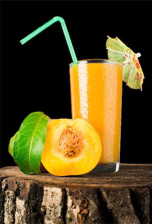 simsearch:400-06388996,k - Peaches and glass with juice black isolated studio shot. Stock Photo - Budget Royalty-Free & Subscription, Code: 400-07246417