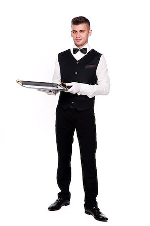 person and cut out and waiter - A young boy waiter with a tray. Isolated background and clipping path Stock Photo - Budget Royalty-Free & Subscription, Code: 400-07246431