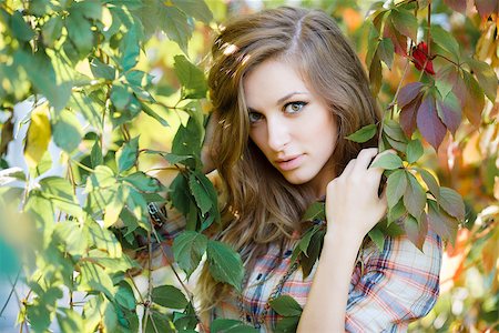 photo of model woman with grapes - beautiful young woman with blonde hair posing looking at camera Stock Photo - Budget Royalty-Free & Subscription, Code: 400-07246540