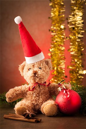 Teddy bear with red santa claus hat and christmas presents Stock Photo - Budget Royalty-Free & Subscription, Code: 400-07246704