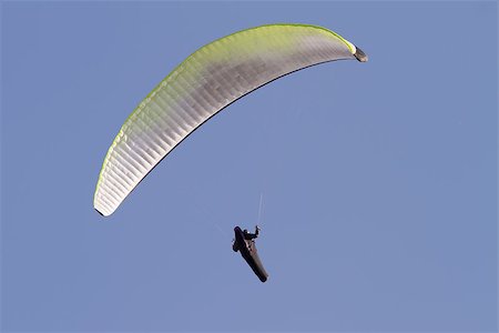 simsearch:400-05157183,k - A paraglider falling from the sky with his parachute Photographie de stock - Aubaine LD & Abonnement, Code: 400-07247369