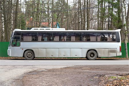 simsearch:400-04001127,k - Gray tour bus. Side view. Empty. Autumn Foto de stock - Royalty-Free Super Valor e Assinatura, Número: 400-07247905