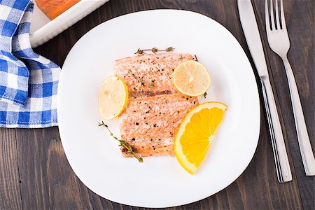 salmon on a colored plate - Delicious salmon fillet with citrus and thyme Stock Photo - Budget Royalty-Free & Subscription, Code: 400-07248073