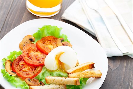 fried egg and pepper - Light breakfast with soft egg, tomato and croutons on a white plate Stock Photo - Budget Royalty-Free & Subscription, Code: 400-07248253