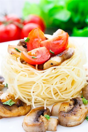 fine noodle - Pasta with fried mushrooms and cherry tomato Stock Photo - Budget Royalty-Free & Subscription, Code: 400-07248276