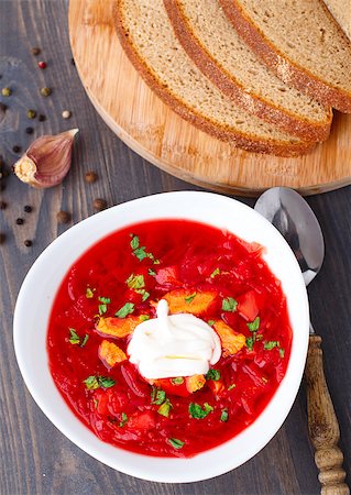 rote-beete-suppe - Ukrainian and russian national red borsch with sour cream Stockbilder - Microstock & Abonnement, Bildnummer: 400-07248273