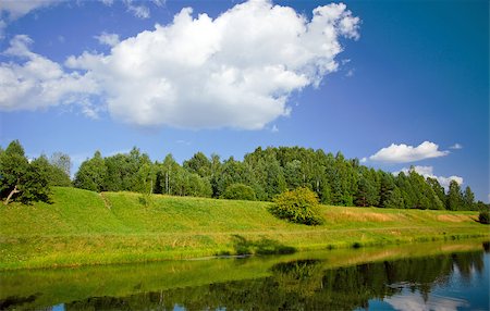 simsearch:400-07107314,k - Summer landscape with a river and grass on the coast Fotografie stock - Microstock e Abbonamento, Codice: 400-07248325