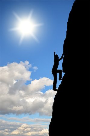 simsearch:400-08035788,k - female silhouette wins the top of the rock in the sky Fotografie stock - Microstock e Abbonamento, Codice: 400-07248693