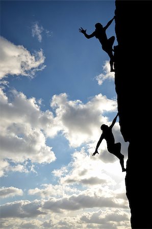 simsearch:400-07208717,k - man on top of the mountain reaches for the sun Photographie de stock - Aubaine LD & Abonnement, Code: 400-07248725