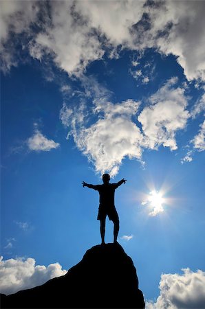 simsearch:400-07208717,k - man on top of the mountain reaches for the sun Photographie de stock - Aubaine LD & Abonnement, Code: 400-07248754