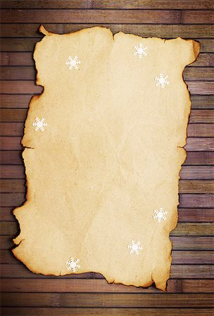 simsearch:400-07179433,k - Old burnt empty paper  and decorative snowflakes,vertical Stock Photo - Budget Royalty-Free & Subscription, Code: 400-07248838