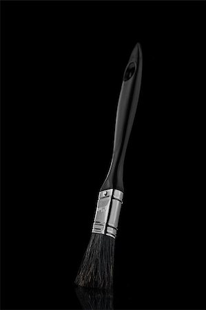 A Black Paint Brush Photographed on a black background with a reflection Foto de stock - Royalty-Free Super Valor e Assinatura, Número: 400-07249065