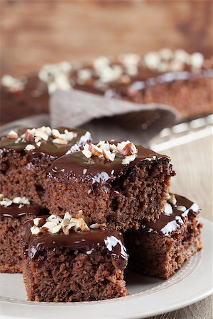 Gingerbread cake with chocolate and hazelnuts. Shallow dof Stock Photo - Budget Royalty-Free & Subscription, Code: 400-07249293