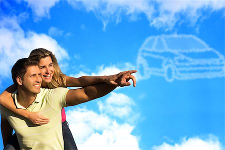 dreaming cloud girl - Happy couple dreaming of a car and pointing to car shaped clouds. Stock Photo - Budget Royalty-Free & Subscription, Code: 400-07249681