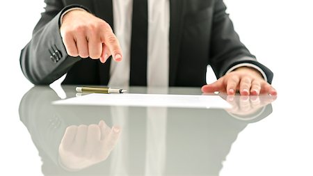 Businessman showing where to sign a contract or insurance papers. Stock Photo - Budget Royalty-Free & Subscription, Code: 400-07249755