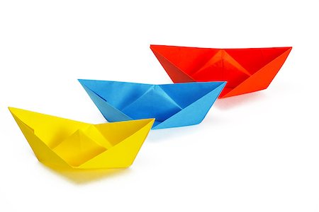 simsearch:400-04177336,k - Three colored paper ship on a white background Stock Photo - Budget Royalty-Free & Subscription, Code: 400-07254306