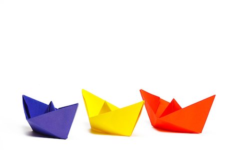 simsearch:400-04177336,k - Three colored paper ship on a white background Stock Photo - Budget Royalty-Free & Subscription, Code: 400-07254308