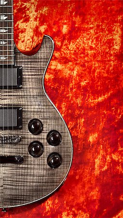 simsearch:400-08134650,k - black electric guitar on red velvet background Stock Photo - Budget Royalty-Free & Subscription, Code: 400-07254561