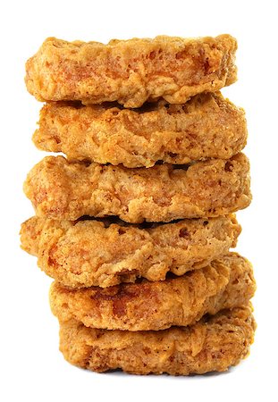 simsearch:400-08696590,k - Delicious breaded chicken pieces on a white background Photographie de stock - Aubaine LD & Abonnement, Code: 400-07256266