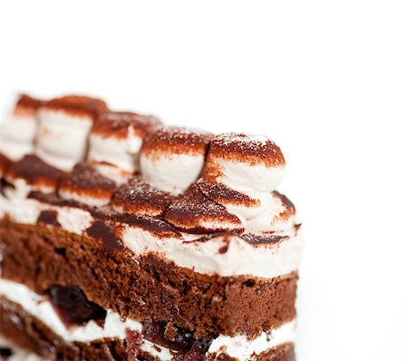 fresh whipped cream dessert cake slice with cocoa powder on top Photographie de stock - Aubaine LD & Abonnement, Code: 400-07256399