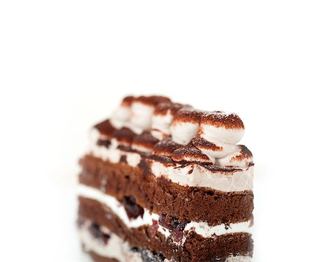 simsearch:400-07256405,k - fresh whipped cream dessert cake slice with cocoa powder on top Fotografie stock - Microstock e Abbonamento, Codice: 400-07256401