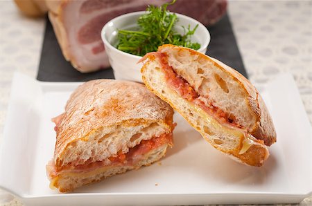 simsearch:400-06641159,k - Italian ciabatta panini sandwich with parma ham and tomato Foto de stock - Super Valor sin royalties y Suscripción, Código: 400-07256412