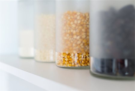 food on a sideboard - glass jars with grain on the shelf Stock Photo - Budget Royalty-Free & Subscription, Code: 400-07257485