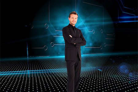 simsearch:400-07258010,k - Composite image of handsome businessman with crossed arms looking at the camera Foto de stock - Royalty-Free Super Valor e Assinatura, Número: 400-07257947