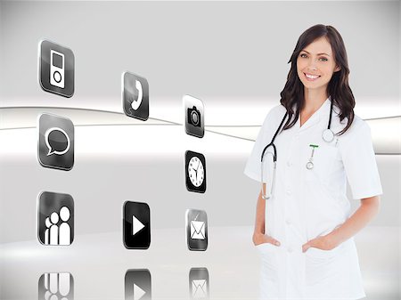 Composite image of confident female doctor standing in front of the window while smiling Stock Photo - Budget Royalty-Free & Subscription, Code: 400-07258184