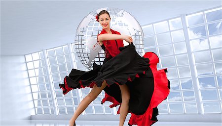 fenêtre sur le monde - Composite image of dancing woman in a red and black dress against a white background Photographie de stock - Aubaine LD & Abonnement, Code: 400-07258225