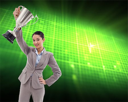 Composite image of portrait of a businesswoman showing a cup Photographie de stock - Aubaine LD & Abonnement, Code: 400-07258357