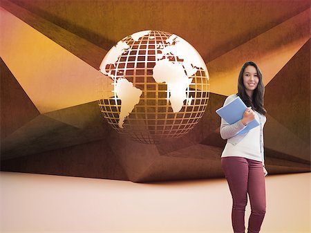 Composite image of student standing in a computer room and holding a folder while smiling Stock Photo - Budget Royalty-Free & Subscription, Code: 400-07258377