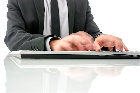Blurred hands typing on computer keyboard. Stock Photo - Budget Royalty-Free & Subscription, Code: 400-07258745