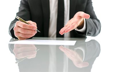 Front view of businessman kindly inviting you to sign a contract. Stock Photo - Budget Royalty-Free & Subscription, Code: 400-07258754