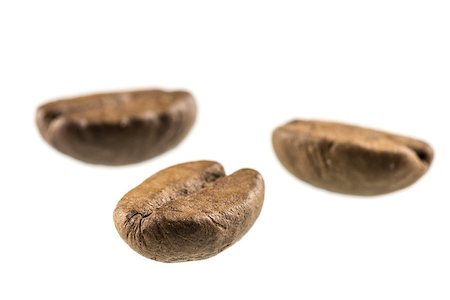 simsearch:400-04689653,k - Three coffee beans isolated over white background. Stock Photo - Budget Royalty-Free & Subscription, Code: 400-07258768