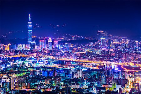 simsearch:400-07261390,k - Modern office buildings in Taipei, Taiwan at night Fotografie stock - Microstock e Abbonamento, Codice: 400-07259995