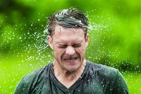 Young Adult Completely Drenched Shaking His head and Making a Funny Face Photographie de stock - Aubaine LD & Abonnement, Code: 400-07250121