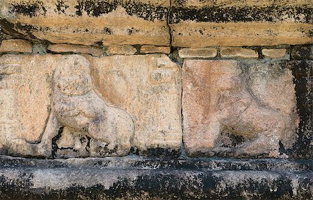 simsearch:400-07105523,k - Ancient stone carving with lions on the ruins of the ancient kingdom capital in Polonnaruwa, Sri Lanka Stock Photo - Budget Royalty-Free & Subscription, Code: 400-07250733