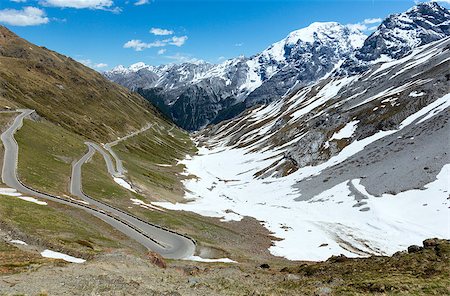 stelvio - Summer Stelvio Pass with snow on mountainside and serpentine road (Italy) Foto de stock - Super Valor sin royalties y Suscripción, Código: 400-07251091