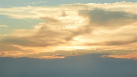 photo frame in heaven - Skyscape in the  evening time. Sun beams punched through the clouds Stock Photo - Budget Royalty-Free & Subscription, Code: 400-07251134