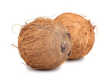 simsearch:659-03521886,k - Two brown ripe coconut isolated on white background Stock Photo - Budget Royalty-Free & Subscription, Code: 400-07251272