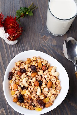 Healthy muesli breakfast, with lots of dry fruits, nuts and grains Stock Photo - Budget Royalty-Free & Subscription, Code: 400-07251453