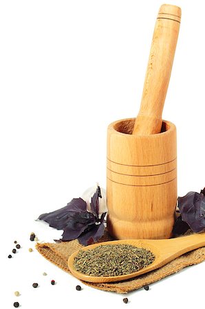 simsearch:400-04348087,k - Wooden mortar and pestle with basil on white background Stock Photo - Budget Royalty-Free & Subscription, Code: 400-07251638